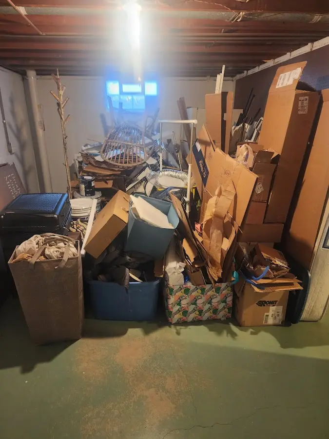 Roll-off dumpster container at job site for 2 Yard Dumpster Rental in Lake City